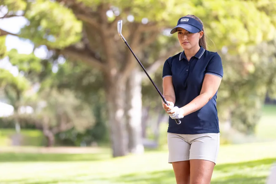 Jae Bowers holding her finish with an iron
