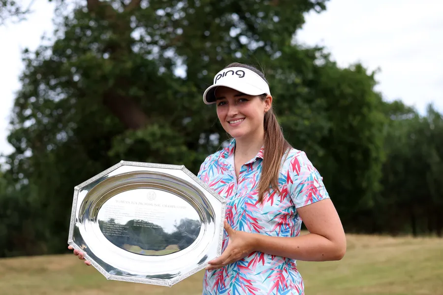 Jae Bowers holding the WPGA Professional Championship trophy